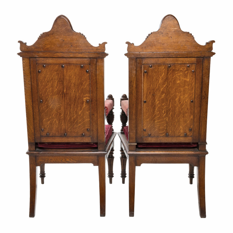Rare Oak Victorian Throne/ Hall Chairs with Fielded Center Panel, Carved Moldings, Carved Pediment, and Turned/ Carved Leg & Arm Supports (Pair)