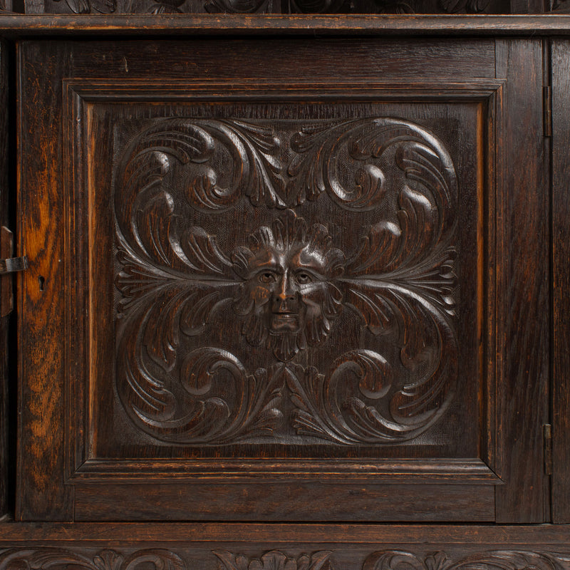 Oak Jacobean Revival Corner Cabinet w/ Hand Carved Details and Stained Glass Fronted Upper Cabinet