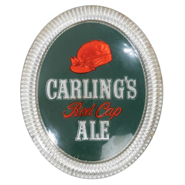 Oval Silver, Red and Green Plastic Carling's Red Cap Ale Sign