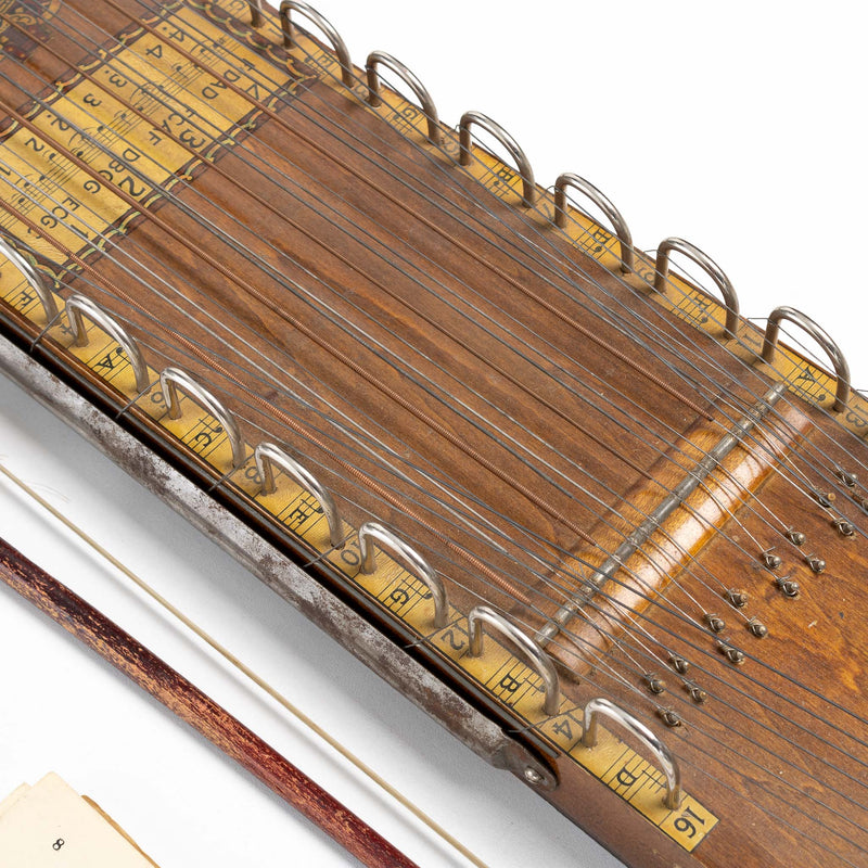 Ukelin String Intrument with Bow and Sheet Music