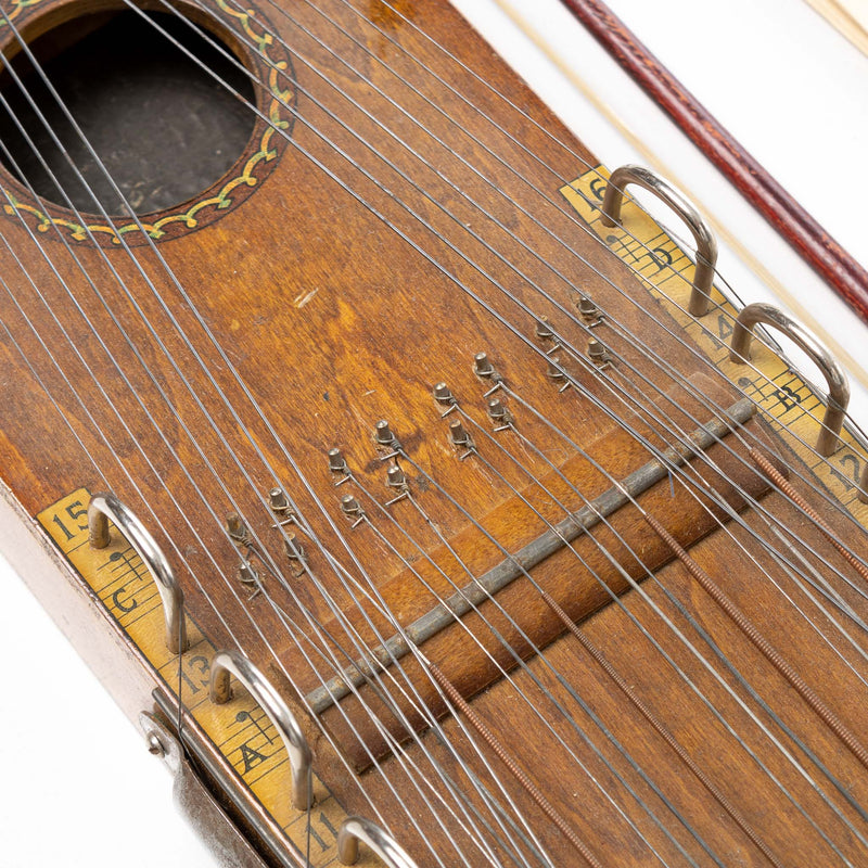 Ukelin String Intrument with Bow and Sheet Music