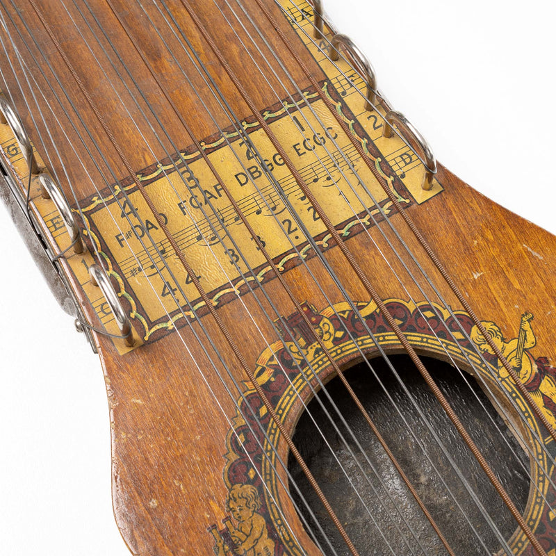 Ukelin String Intrument with Bow and Sheet Music